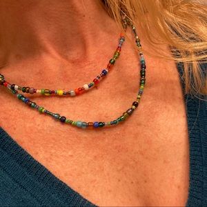 Glass Mardi Gras necklace bracelet headband throws New Orleans waist beads belt